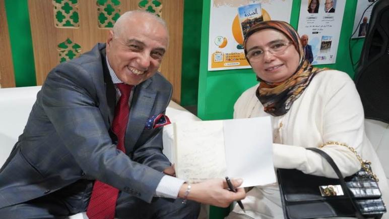 معرض الكتاب .. الكاتب والروائي نور الدين الرياحي يوقع روايته الاولي الصخــرة برواق دار الثقافة